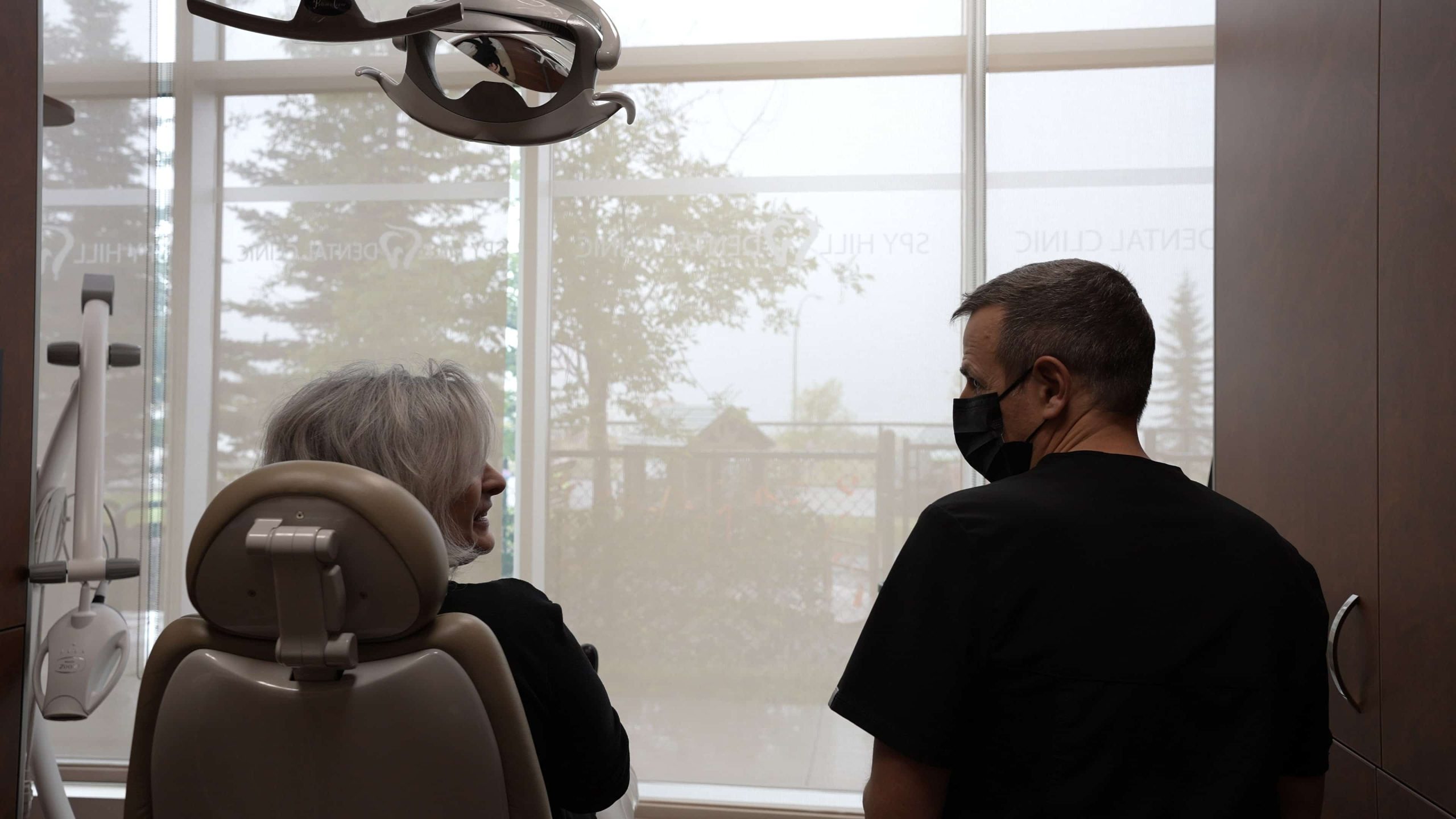 A skilled dentist fits durable dental crowns.
